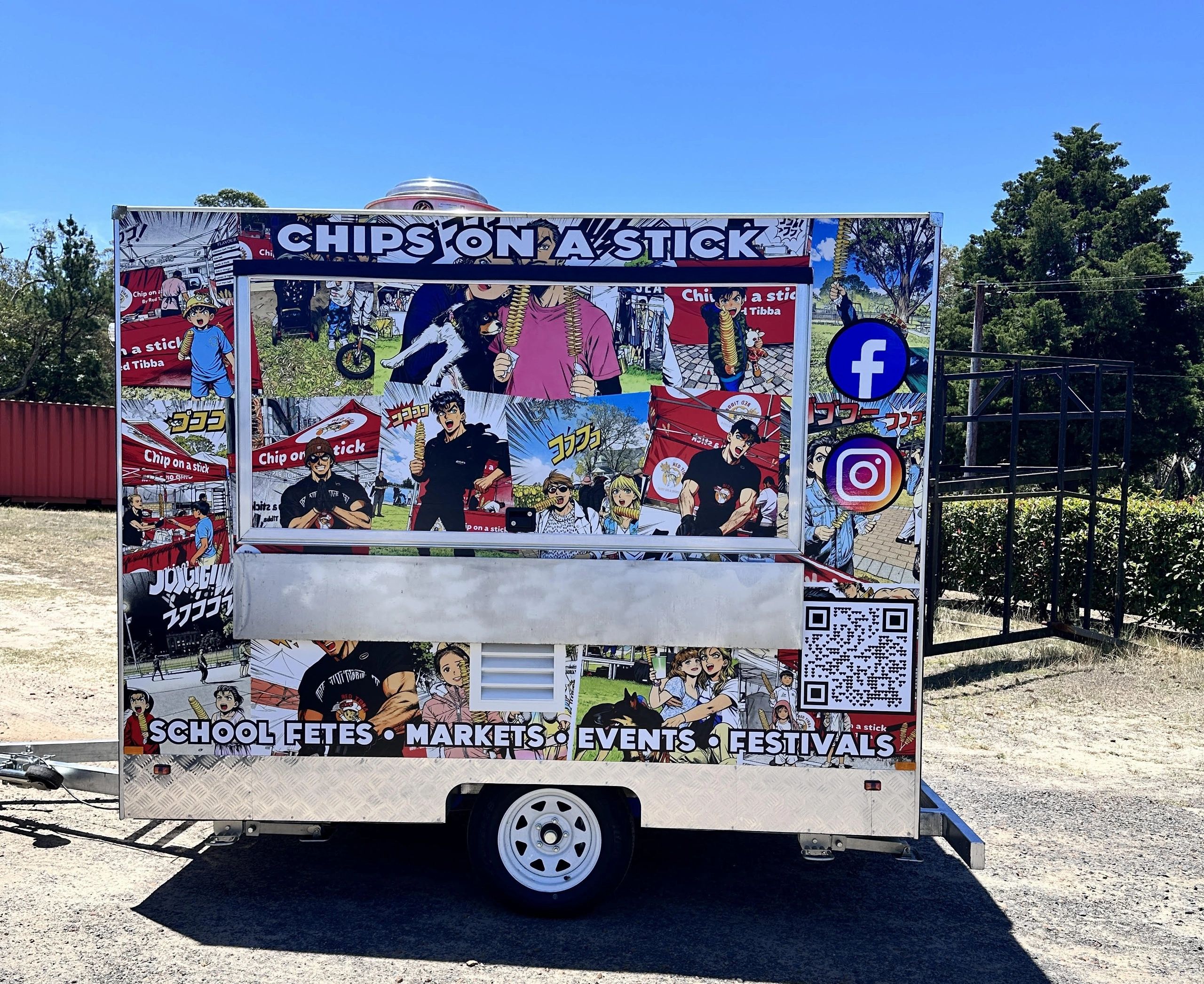 Colourful food truck with vibrant branding at an outdoor event