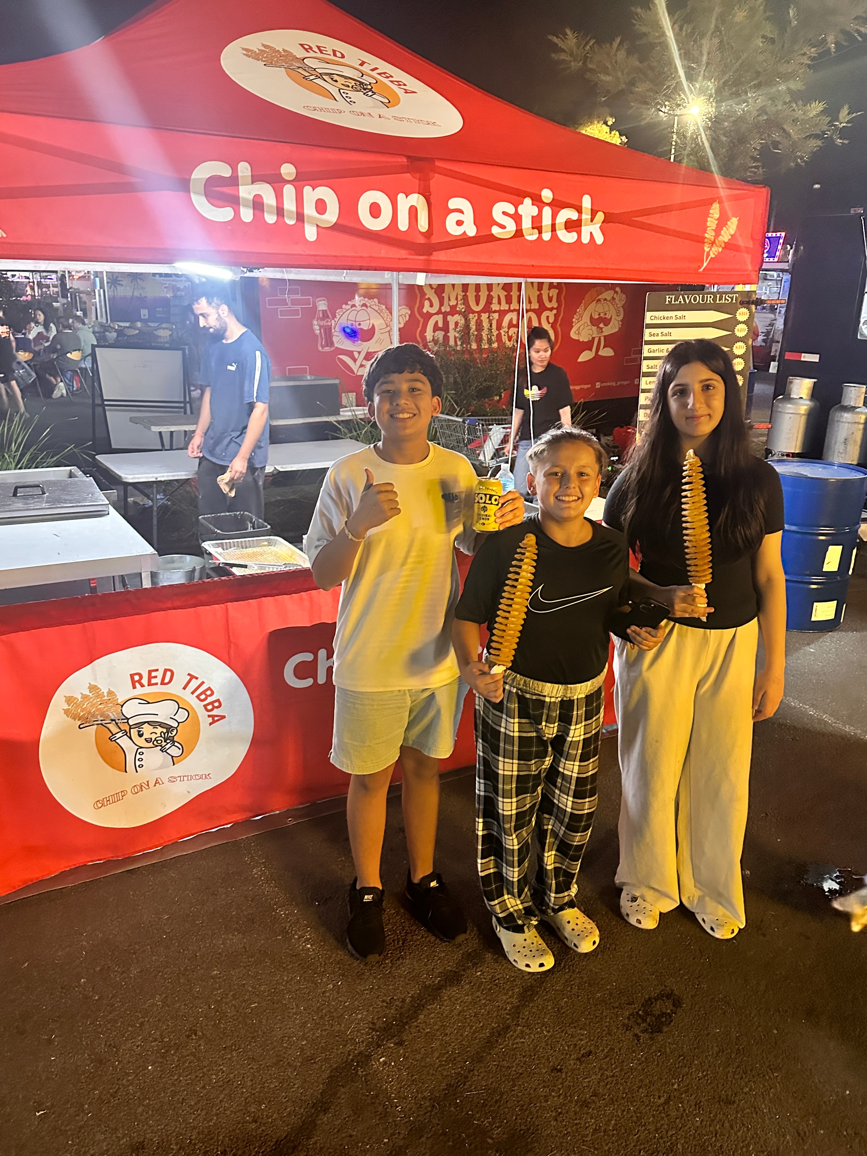 Chips on a Stick vendor serving customers